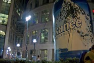 Photo of a tall inflatable beer can in the public plaza at the Vancouver Public Library Main Branch. 